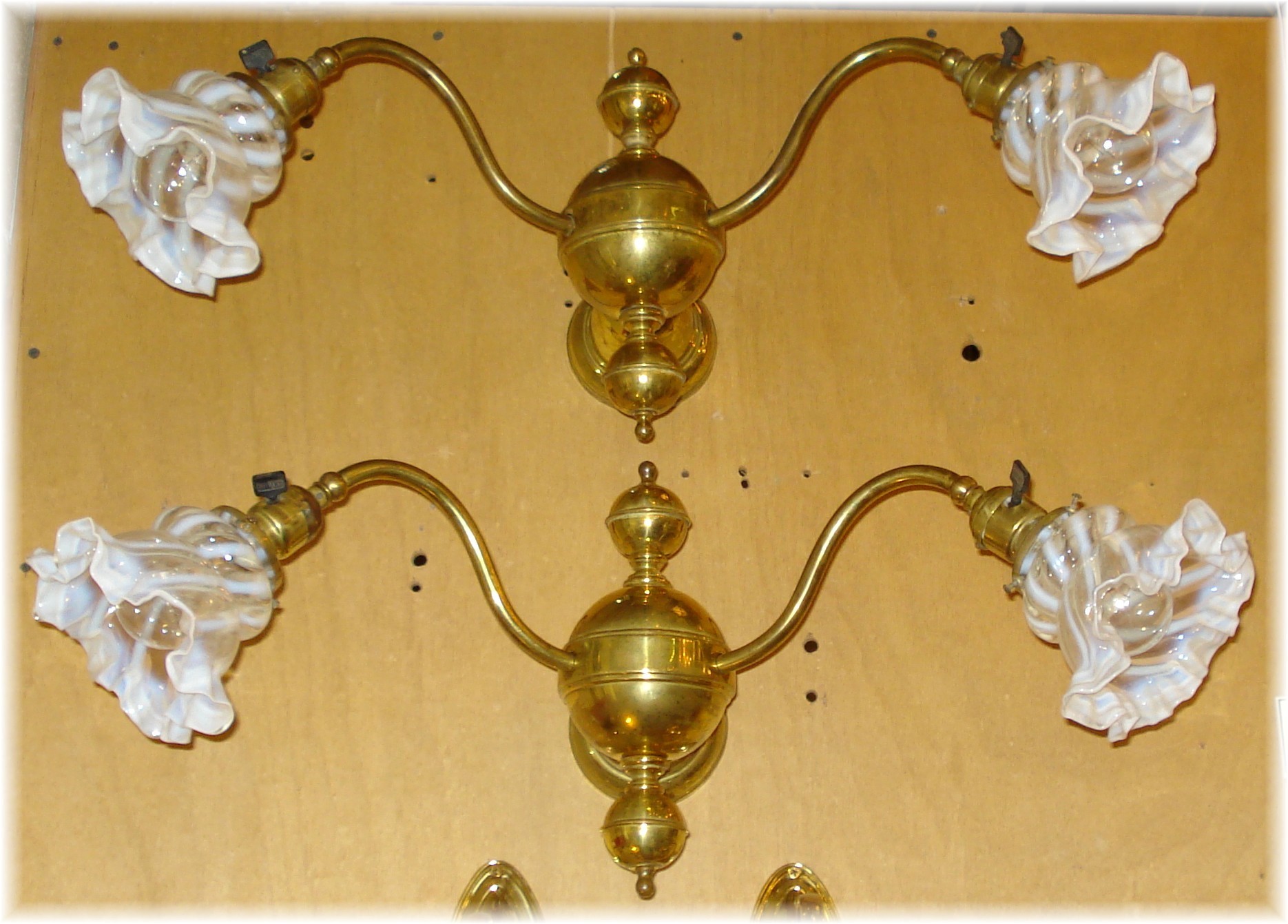 Early electric 2 arm sconces